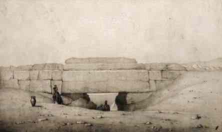 A giant stone serves as the roof of the gate of the workmen.